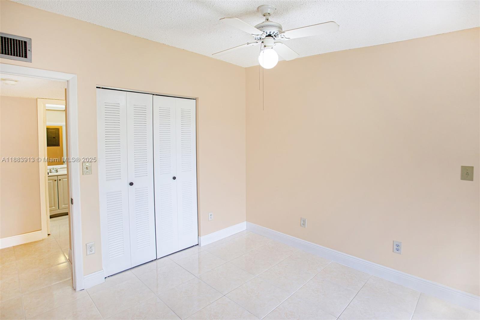 9711 West McNab Road, Unit 203 Tamarac, FL 33321 - Photo 13 of 37 a view of an empty room
