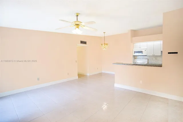 a view of a room with an empty space