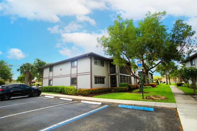 a view of a swimming pool with a lounge chairs