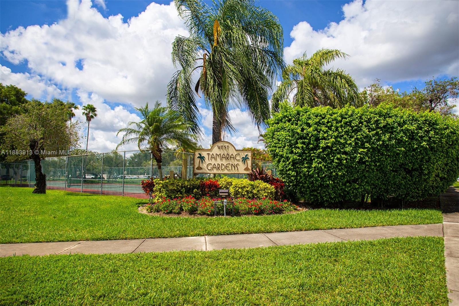 9711 West McNab Road, Unit 203 Tamarac, FL 33321 - Photo 37 of 37 a view of a yard