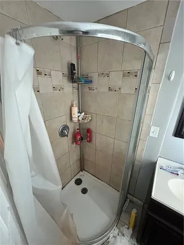 a room with furniture and view kitchen