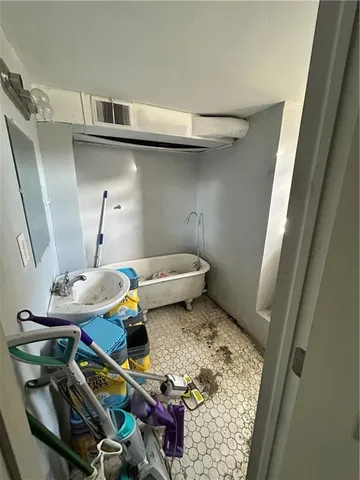 a view of a backyard with a sitting area