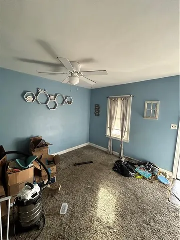 a room with a window and gym equipment