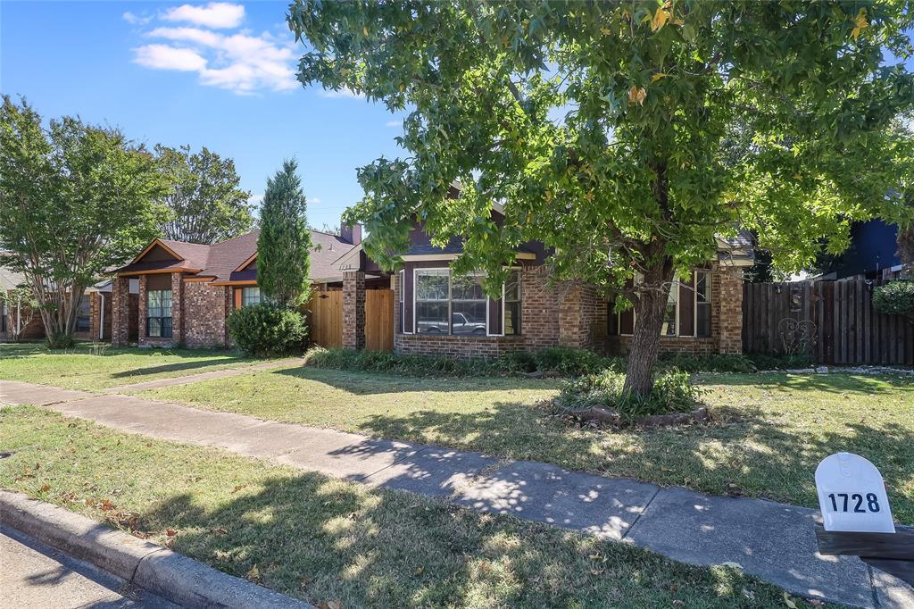 1728 Hackamore Street Mesquite, TX 75149 - Photo 3 of 22 Side view showing sidewalk and address