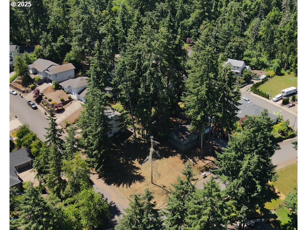 South 69th Place Springfield, OR 97478 - Photo 11 of 16 a view of a lake with a house