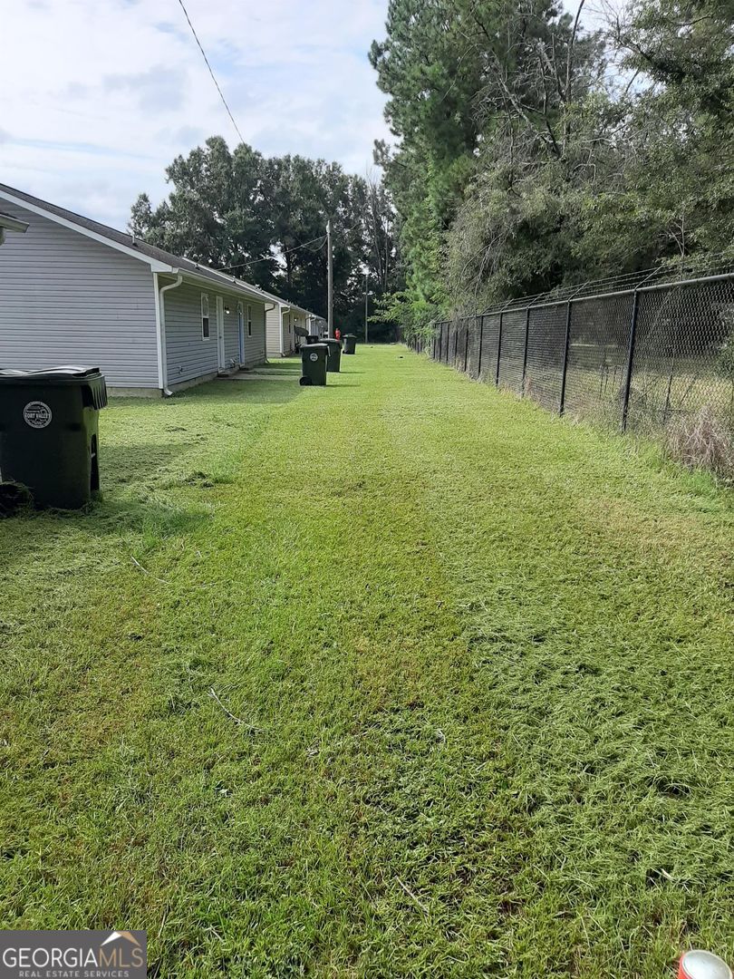 704 Green Street, Unit B Fort Valley, GA 31030 - Photo 11 of 11 a view of a backyard