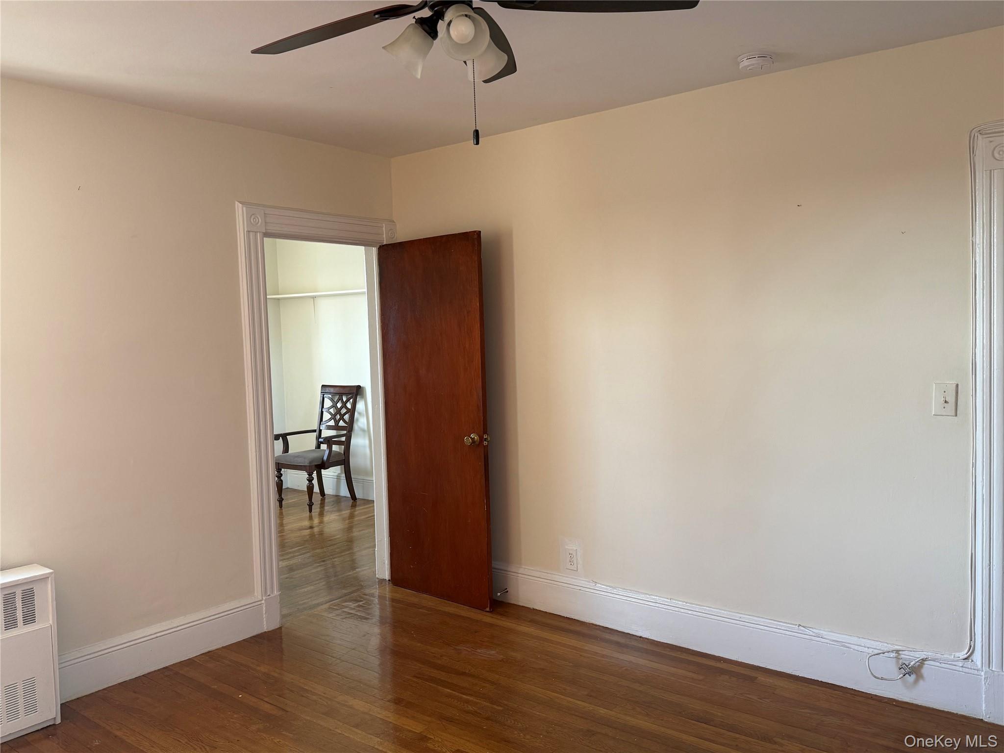 4759 Matilda Avenue, Unit 2 Bronx, NY 10470 - Photo 4 of 10 a view of an empty room with wooden floor