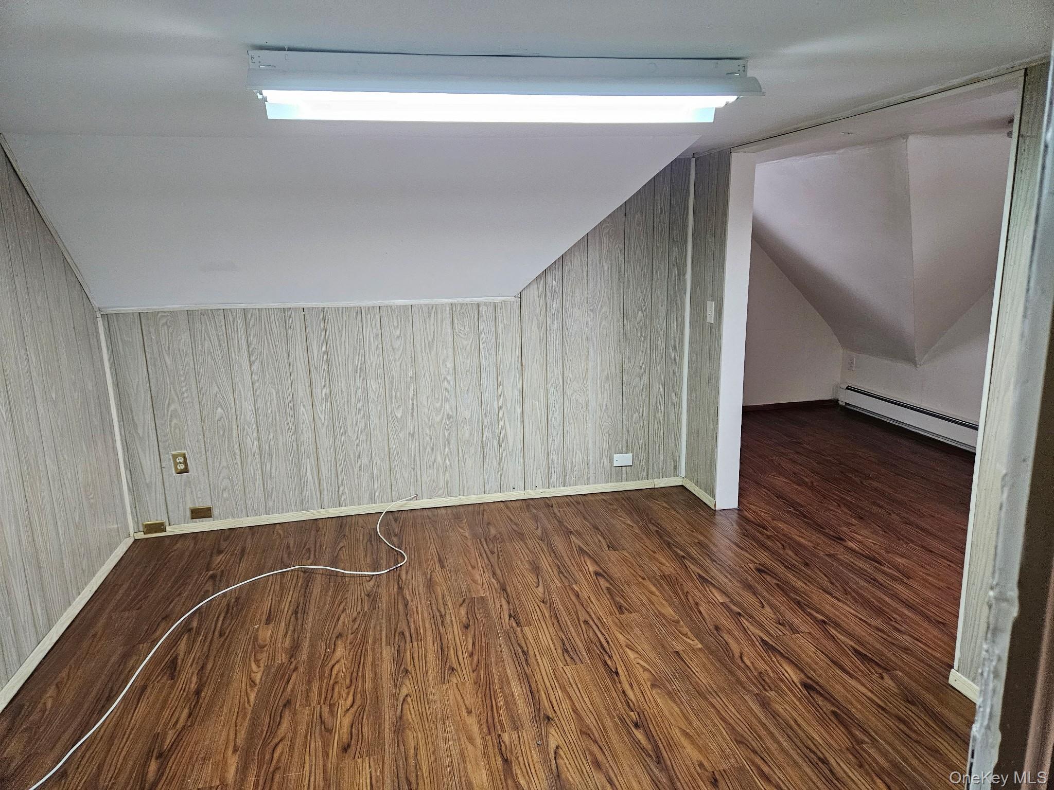 4759 Matilda Avenue, Unit 2 Bronx, NY 10470 - Photo 9 of 10 a view of an empty room with wooden floor and closet