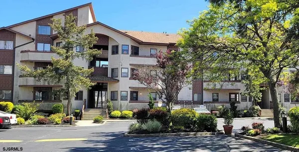 a front view of a building with street view