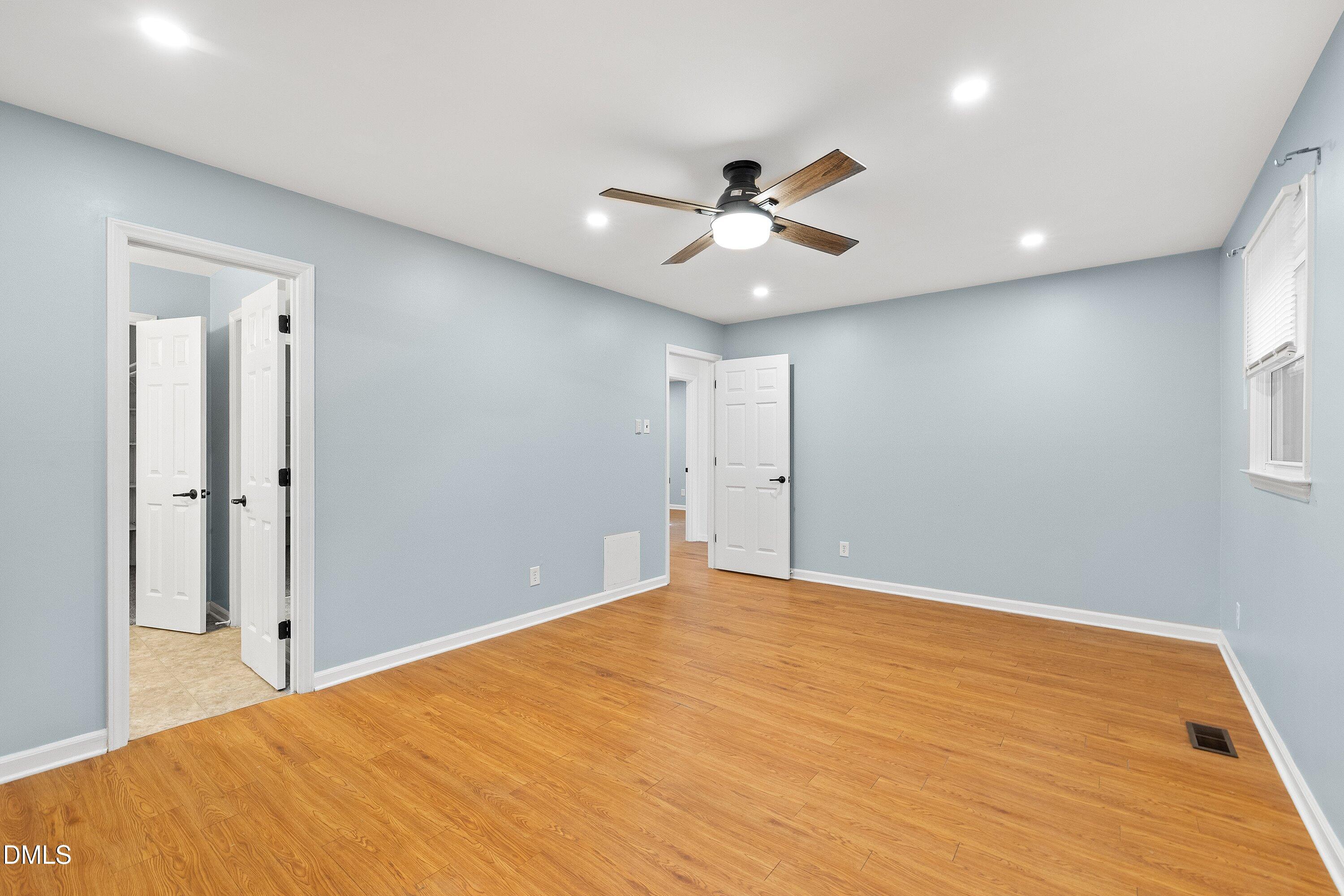 5917 Scalybark Road Durham, NC 27712 - Photo 22 of 47 a view of an empty room
