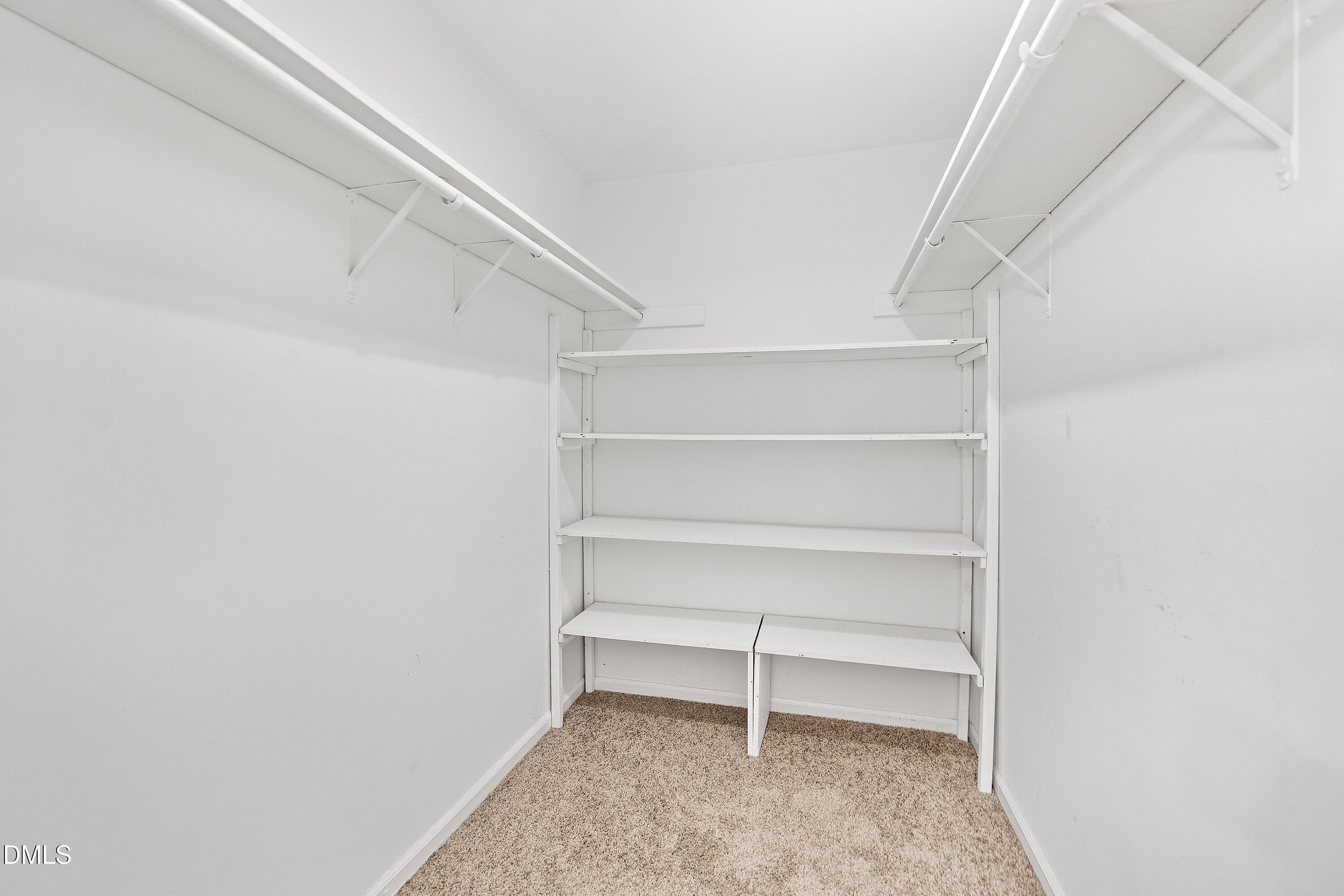 5917 Scalybark Road Durham, NC 27712 - Photo 25 of 47 a view of an empty walk in closet