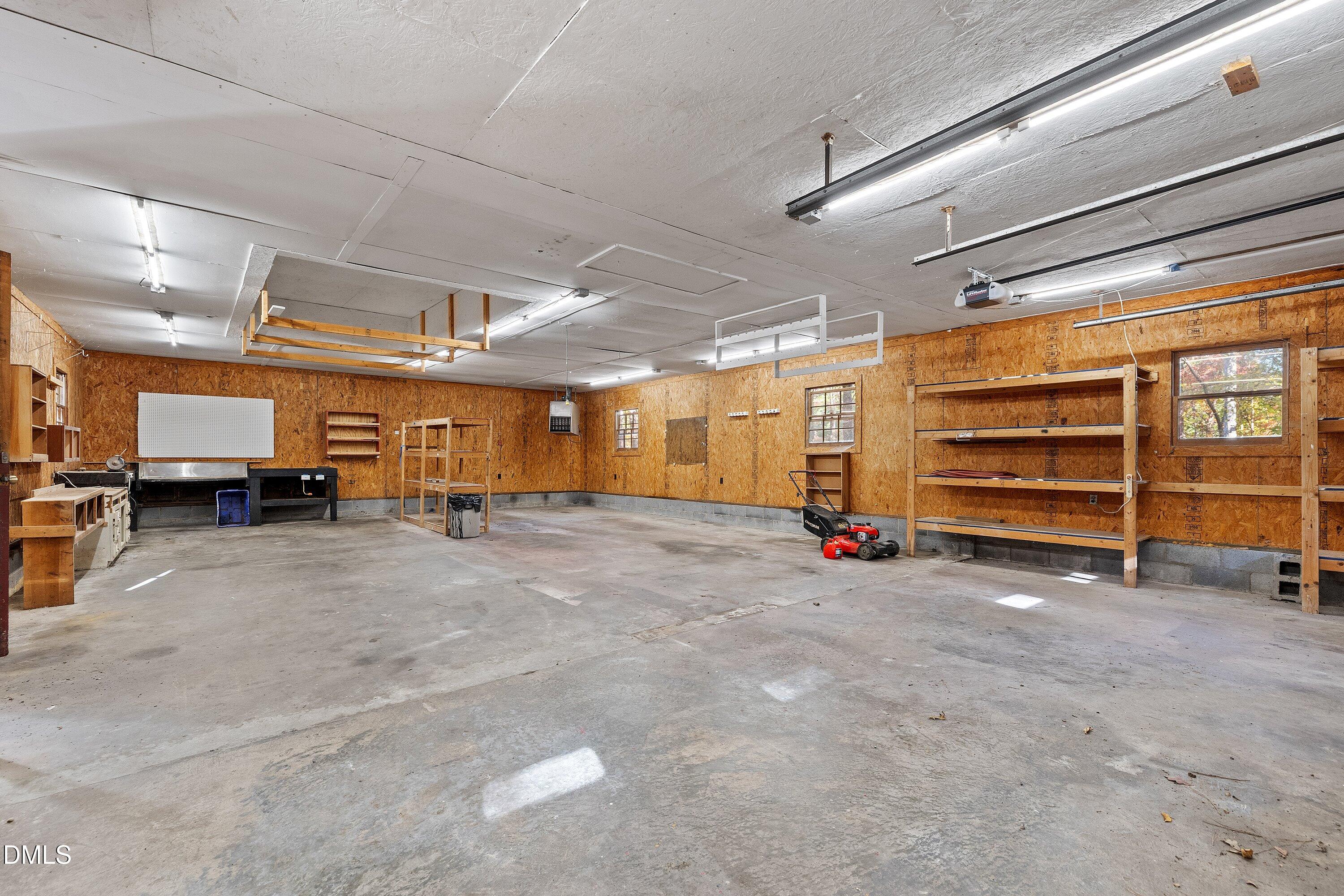 5917 Scalybark Road Durham, NC 27712 - Photo 40 of 47 a view of a room with gym equipment