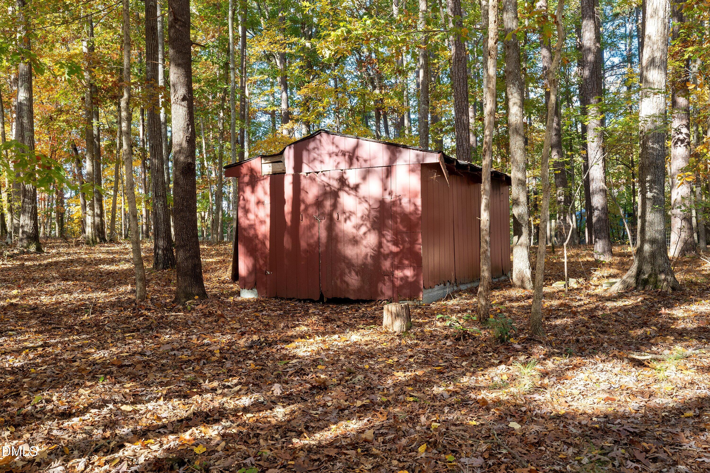 5917 Scalybark Road Durham, NC 27712 - Photo 42 of 47 a view of outdoor space with trees