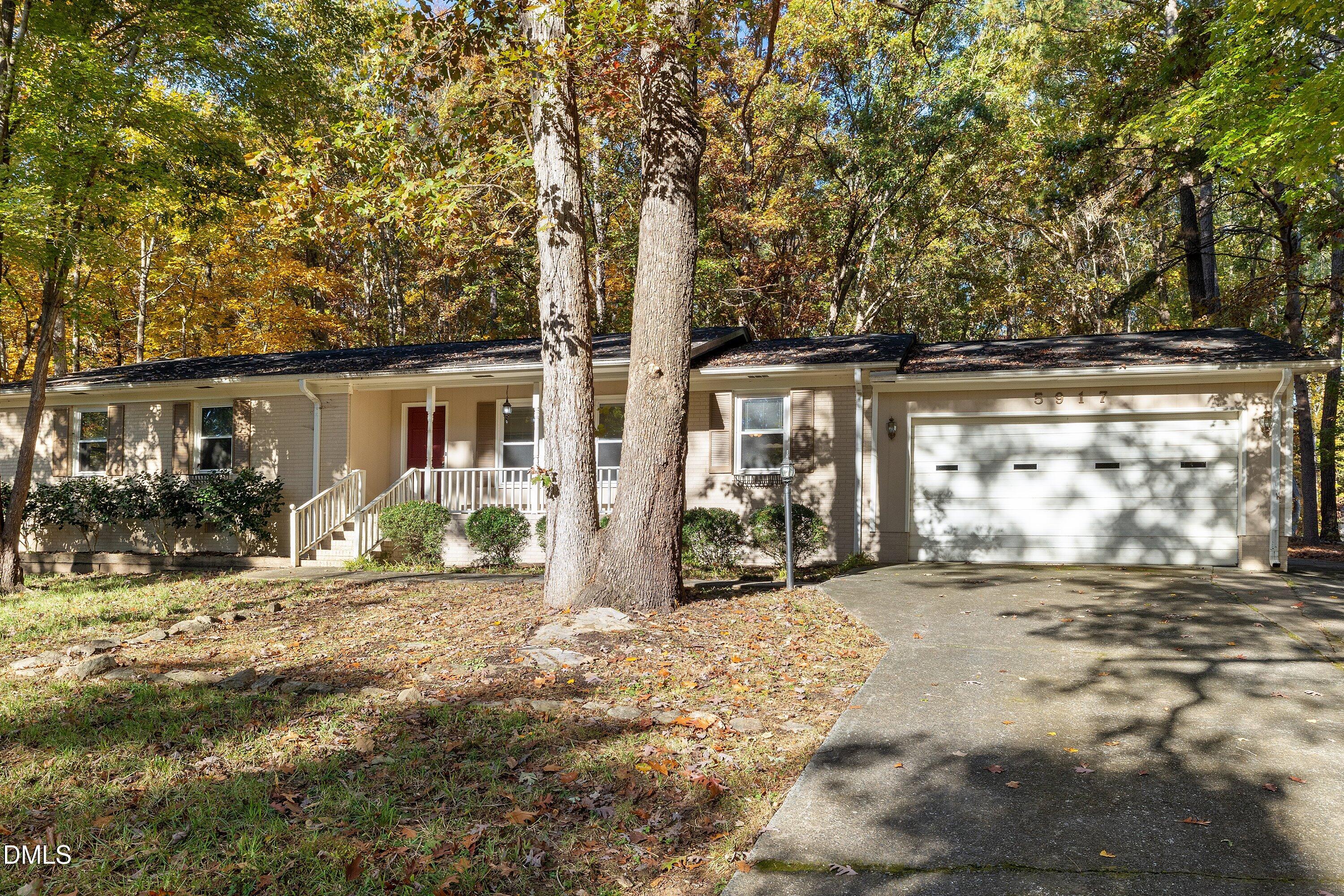 5917 Scalybark Road Durham, NC 27712 - Photo 5 of 47 a view of a house with a outdoor space