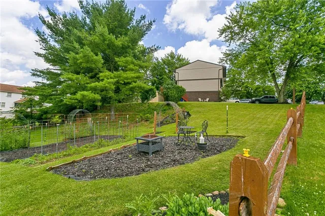 a view of a garden with a slide