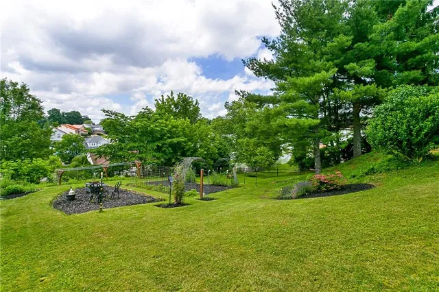 a view of a chairs and tables on the deck