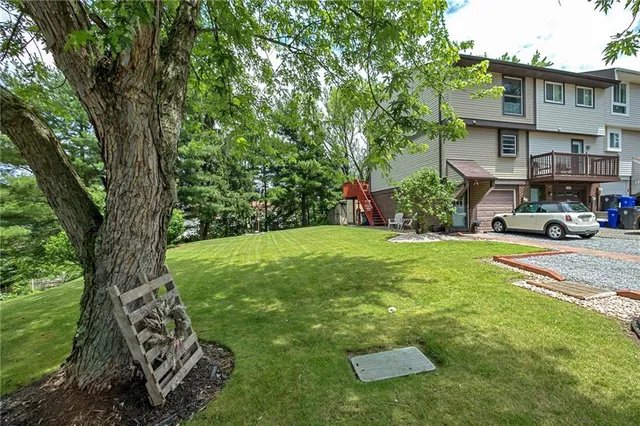 a house view with a garden space
