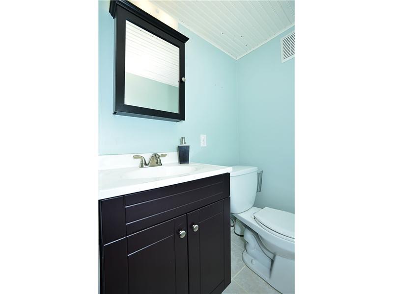 135 Raccoon Way Gibsonia, PA 15044 - Photo 14 of 15 Partial Bath. Updated lower level partial bath.
