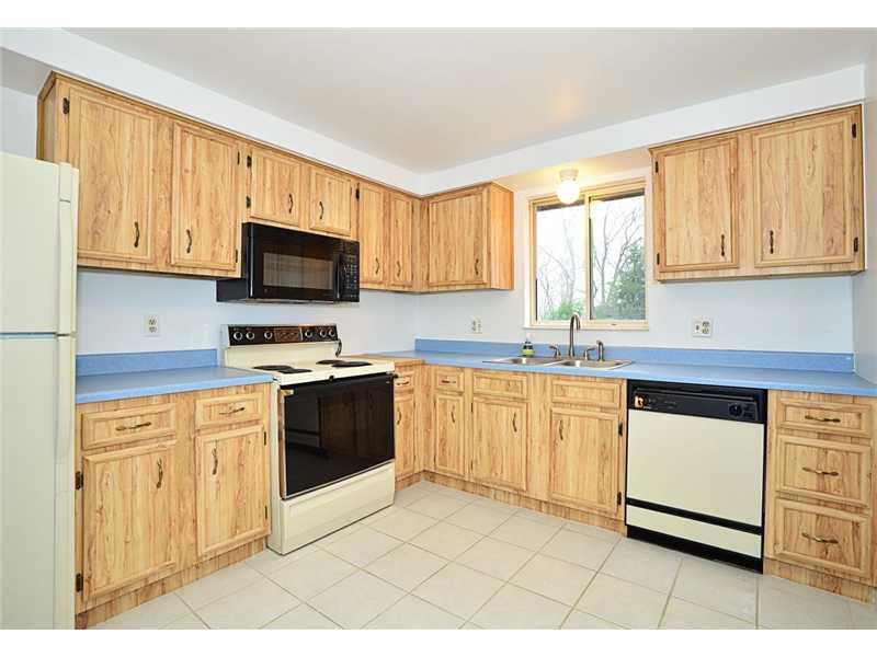 135 Raccoon Way Gibsonia, PA 15044 - Photo 5 of 15 Kitchen. Spacious kitchen with ceramic tile floor and room for seating area. All appliances staying.
