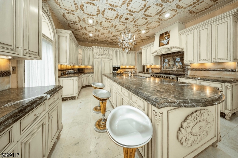 1 Hamilton Avenue Weehawken, NJ 07086 - Photo 15 of 40 a kitchen with sink stove and cabinets
