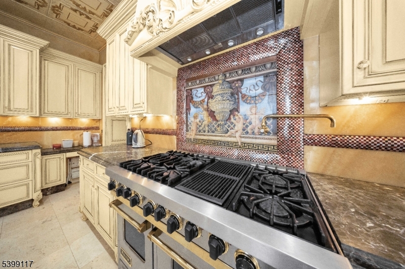 1 Hamilton Avenue Weehawken, NJ 07086 - Photo 17 of 40 a white stove top oven sitting inside of a kitchen