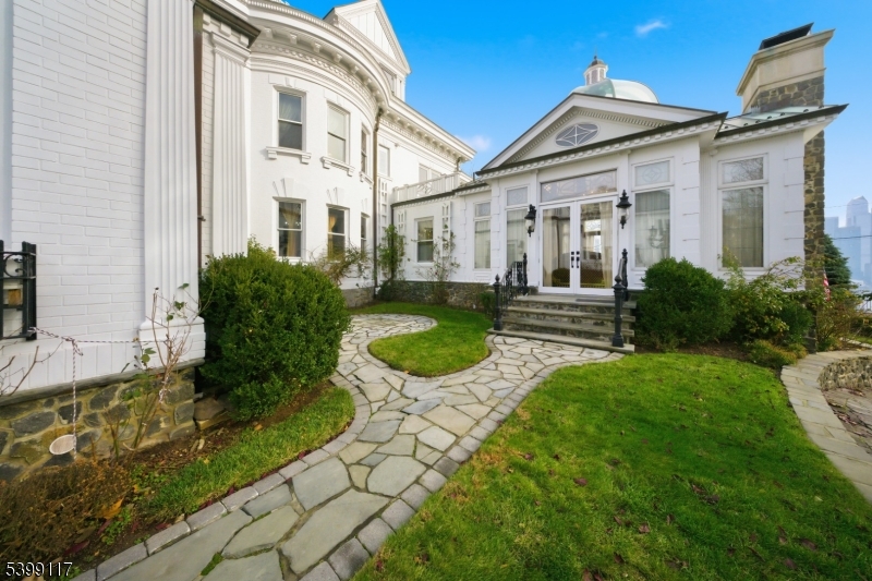 1 Hamilton Avenue Weehawken, NJ 07086 - Photo 3 of 40 a front view of a house with garden