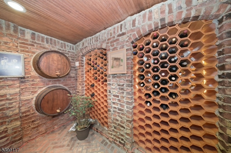 1 Hamilton Avenue Weehawken, NJ 07086 - Photo 39 of 40 a bathroom with a granite countertop toilet and a sink