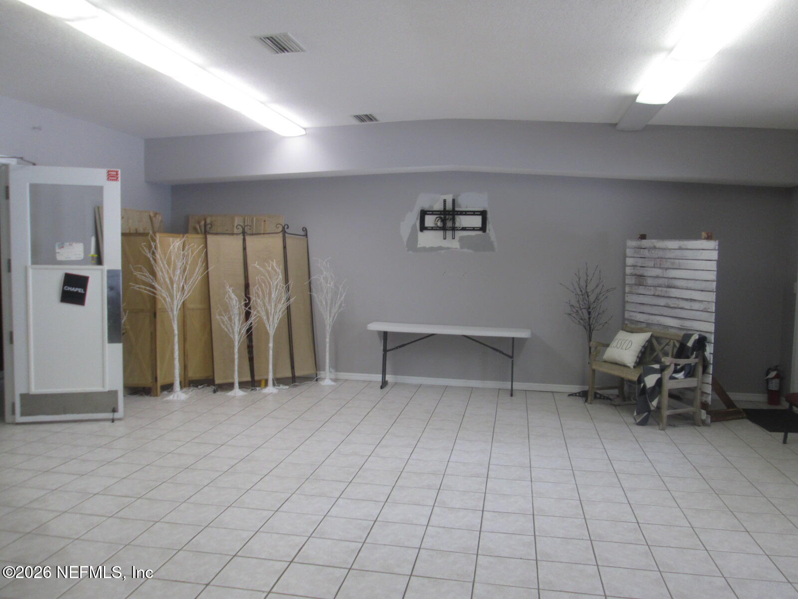 555 Highway 16 St. Augustine, FL 32084 - Photo 20 of 60 an empty room with windows