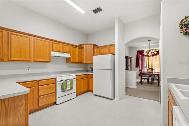 a view of a living room and bathroom