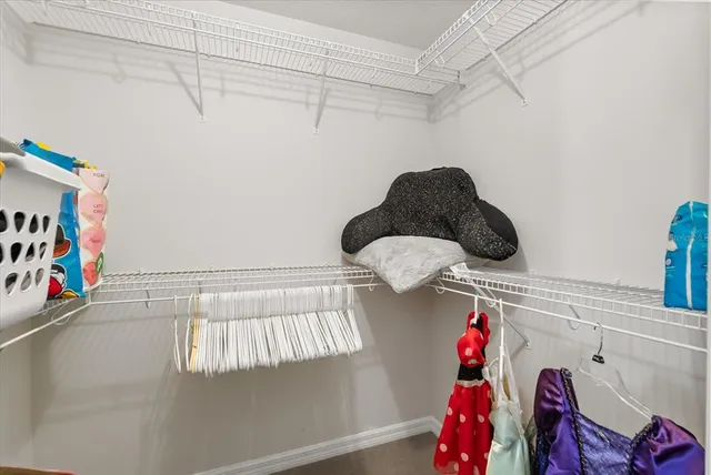 a spacious bathroom with sink shower and a bathtub