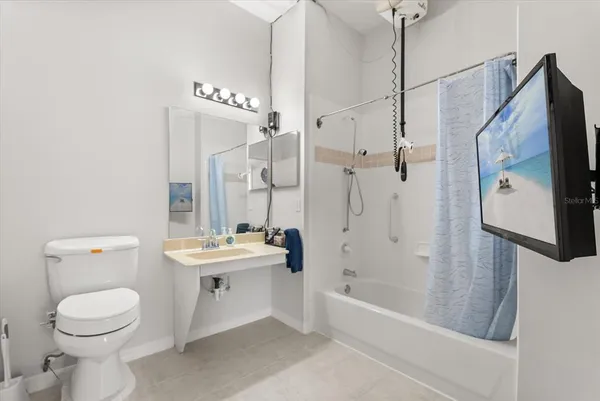 a view of storage and utility room with a washer and dryer