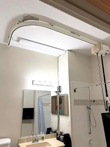 a bedroom with a bed and a chair