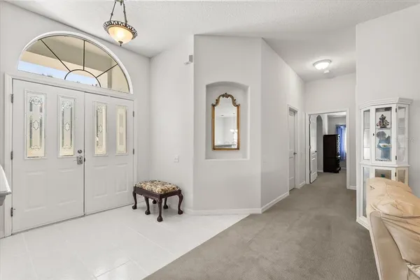 a view of a livingroom with a furniture and entryway