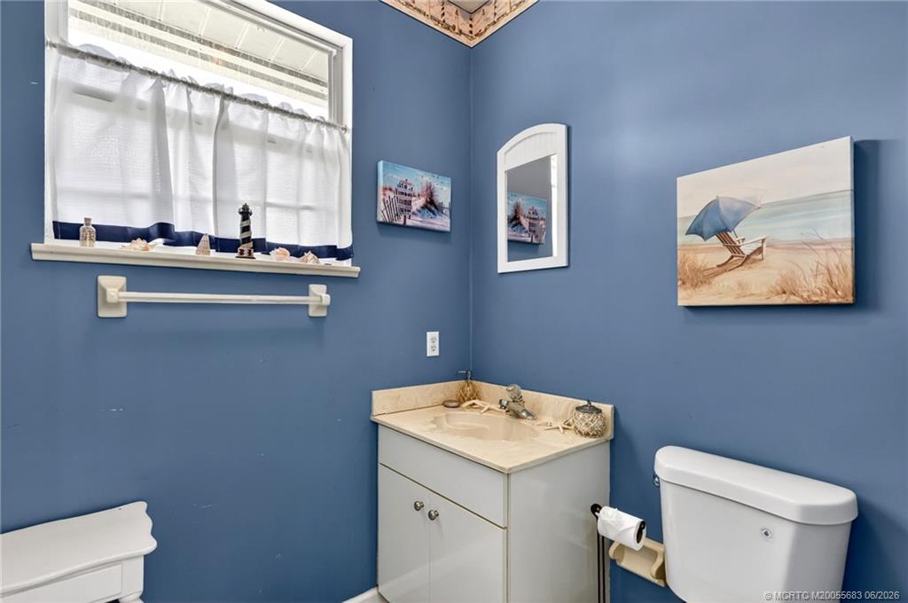 671 Southeast Pin Oak Terrace Stuart, FL 34997 - Photo 45 of 67 Half bath on patio.