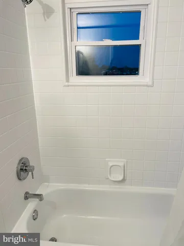 a bathroom with a bathtub