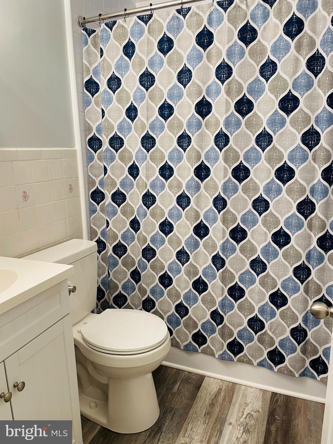 4435 Scotia Road Baltimore, MD 21227 - Photo 10 of 20 a bathroom with a toilet and a sink