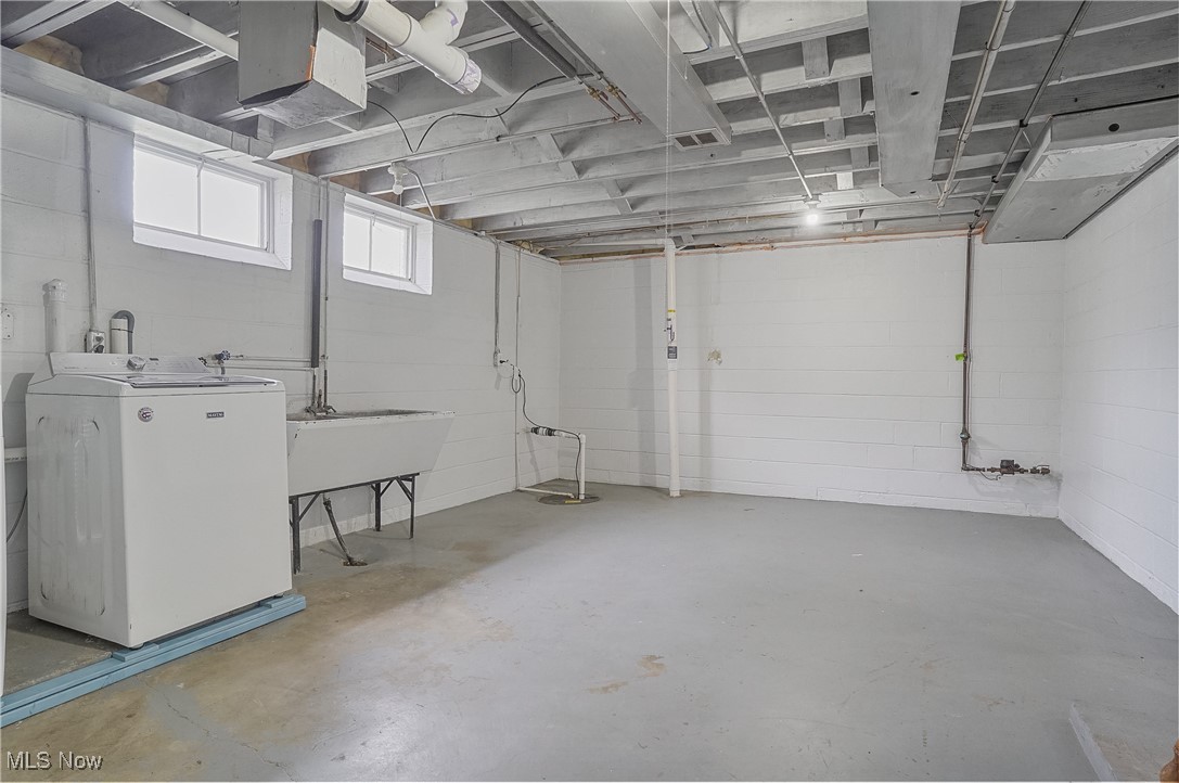 33825 Cannon Road Solon, OH 44139 - Photo 44 of 44 Below grade area with washer / clothes dryer and concrete block wall