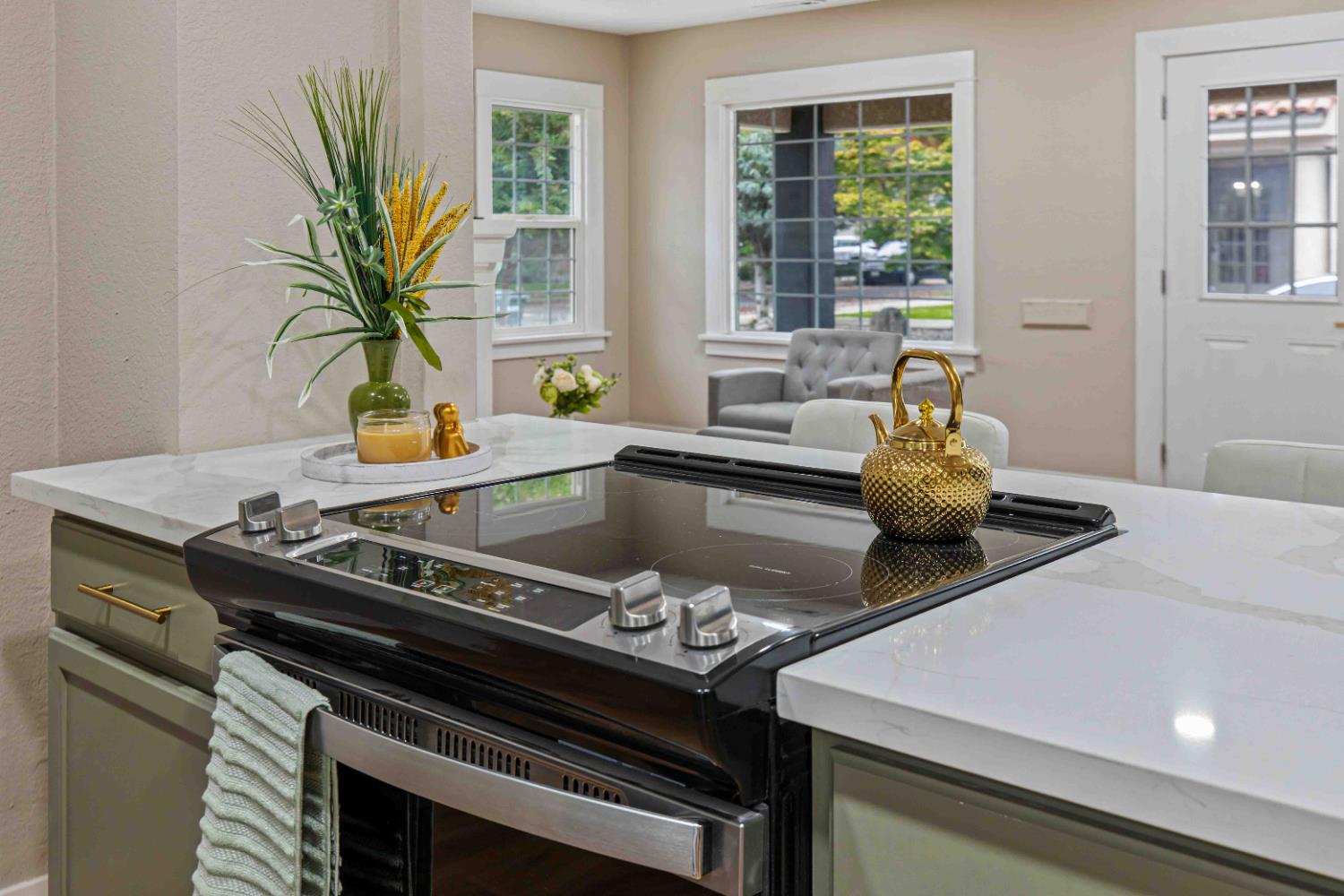 223 Achor Court Modesto, CA 95354 - Photo 12 of 26 a kitchen with a stove and a white wooden cabinets
