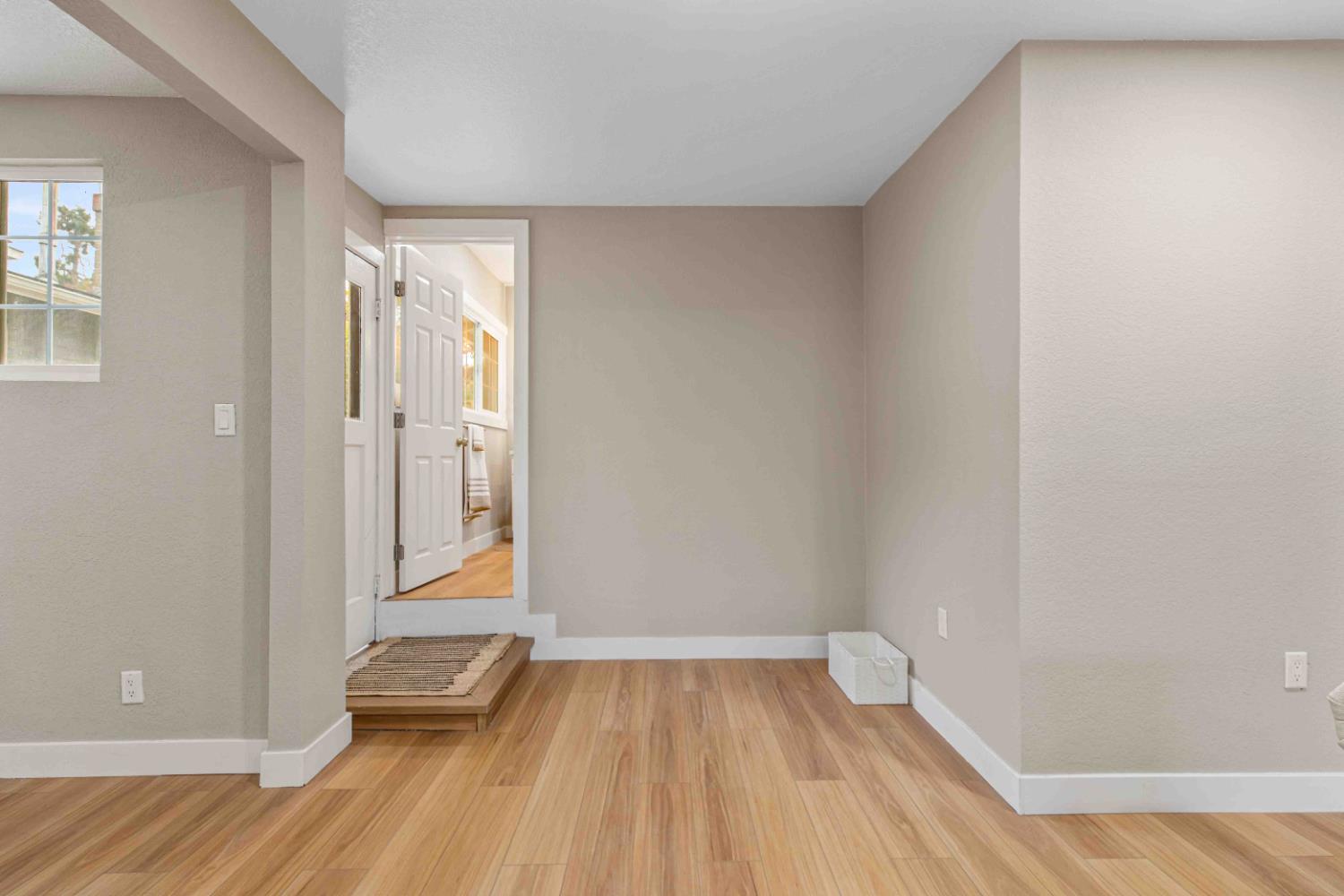 223 Achor Court Modesto, CA 95354 - Photo 17 of 26 a view of a room with wooden floor and bench