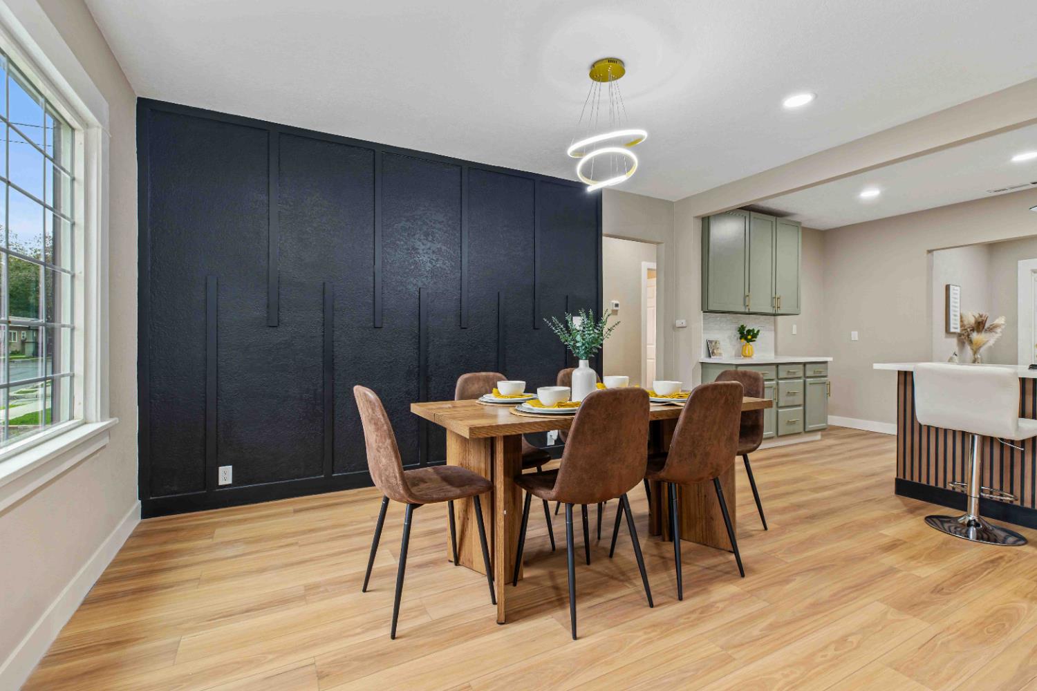 223 Achor Court Modesto, CA 95354 - Photo 6 of 26 a view of a dining room with furniture and wooden floor