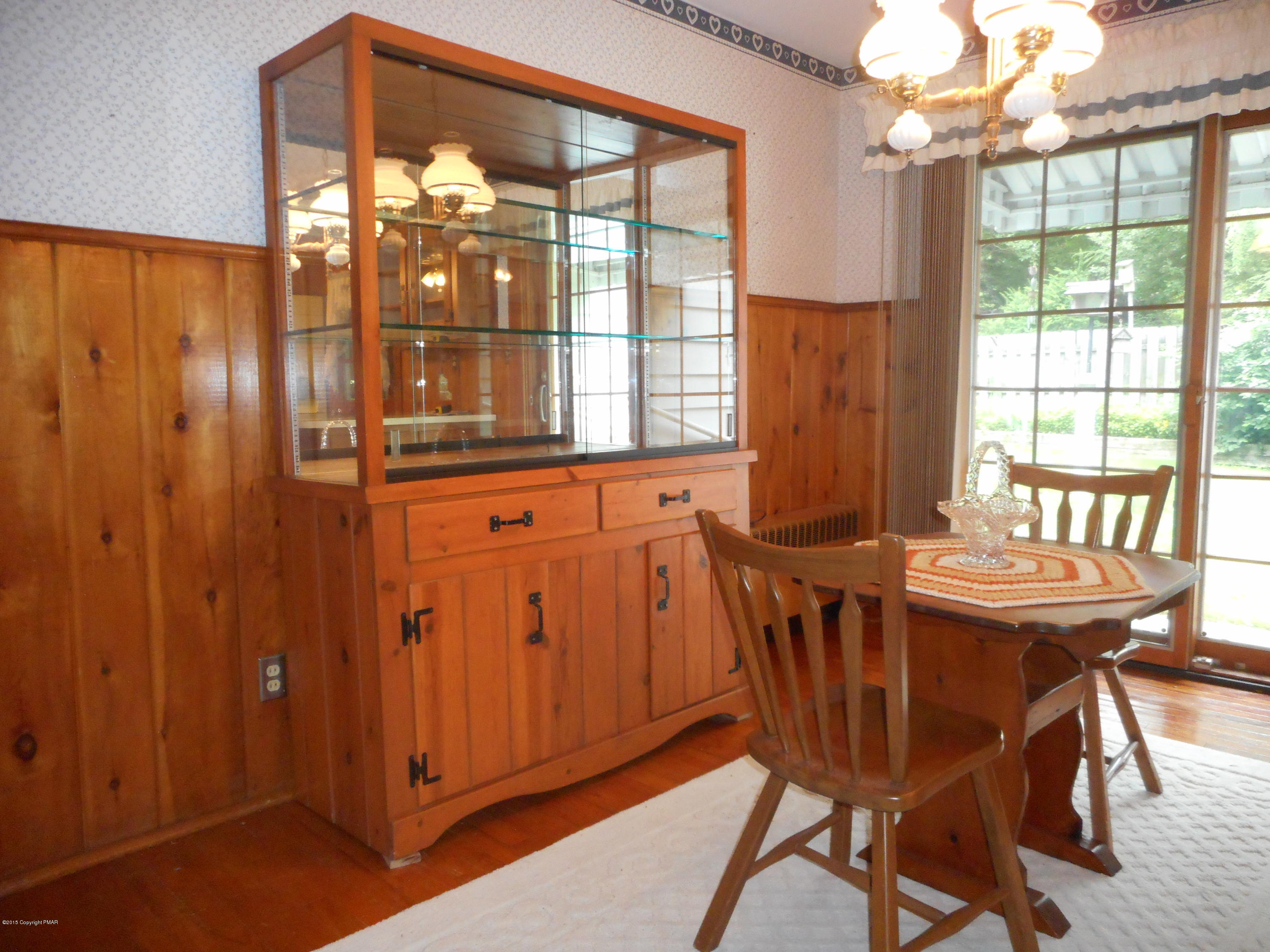 8115 Oak Ridge Lane Cresco, PA 18326 - Photo 15 of 42 Dining room with matching hutch