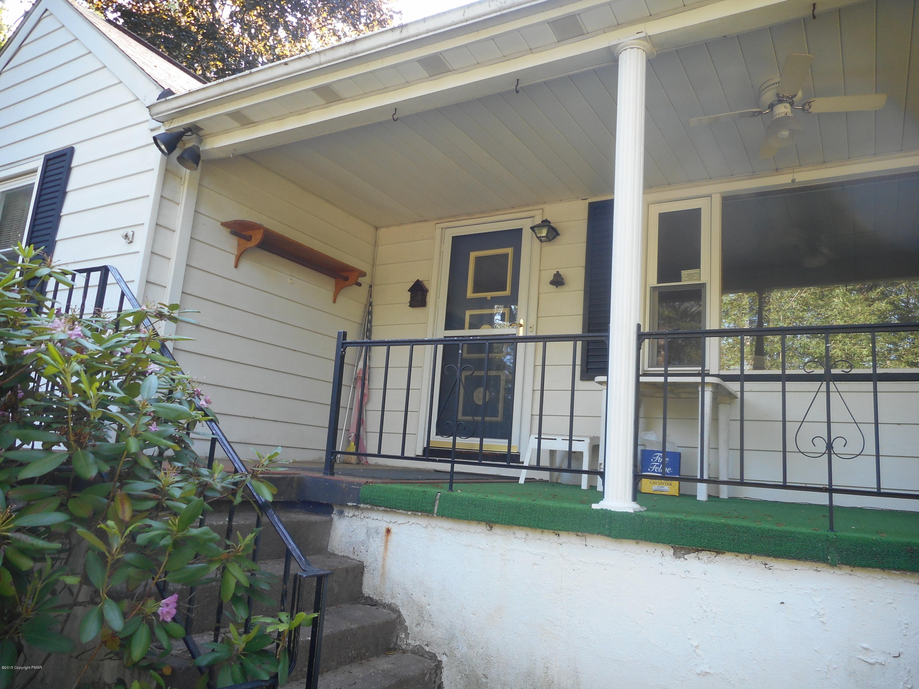 8115 Oak Ridge Lane Cresco, PA 18326 - Photo 3 of 42 Front porch entrance