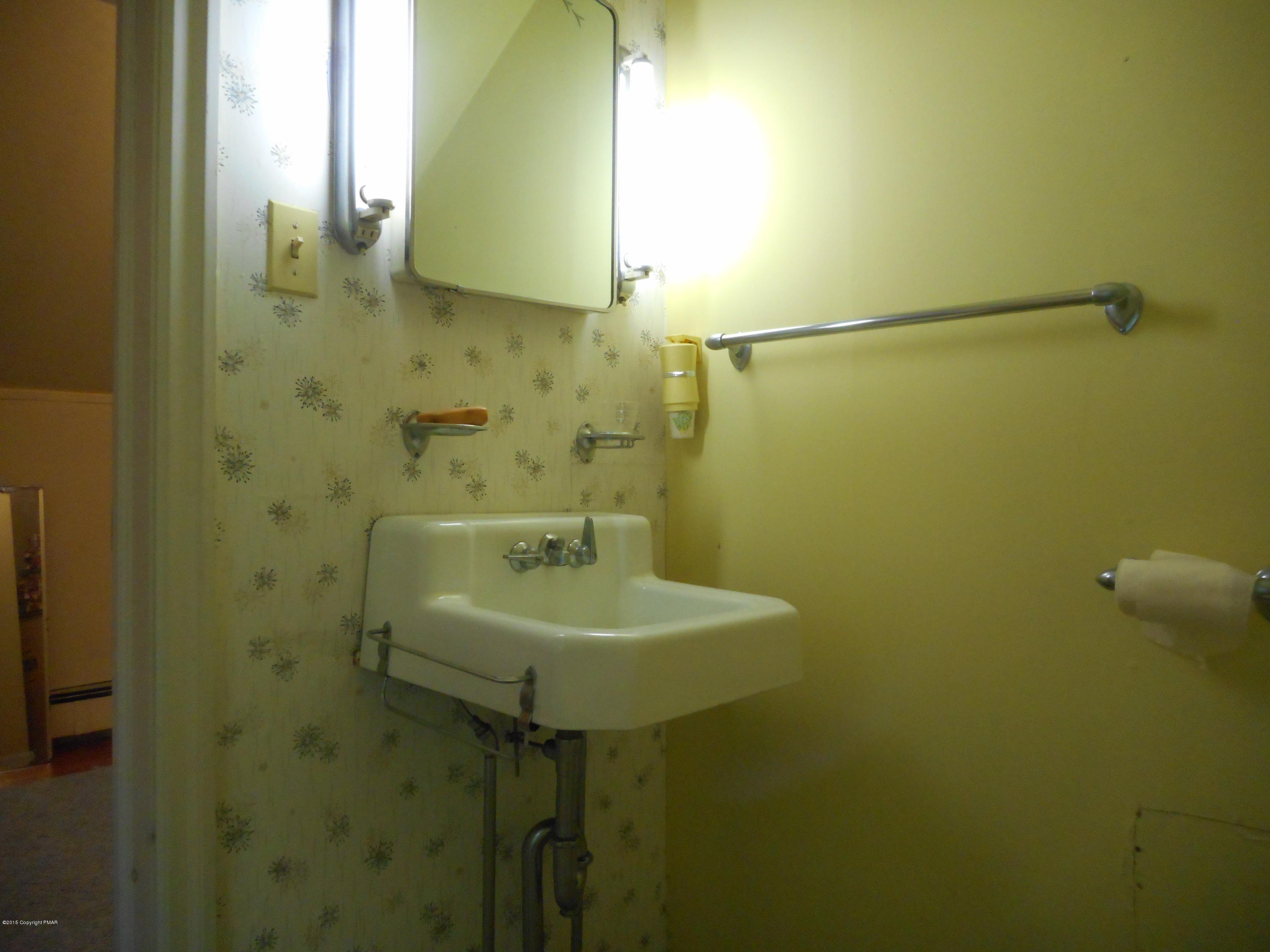 8115 Oak Ridge Lane Cresco, PA 18326 - Photo 31 of 42 Sink area of half bath