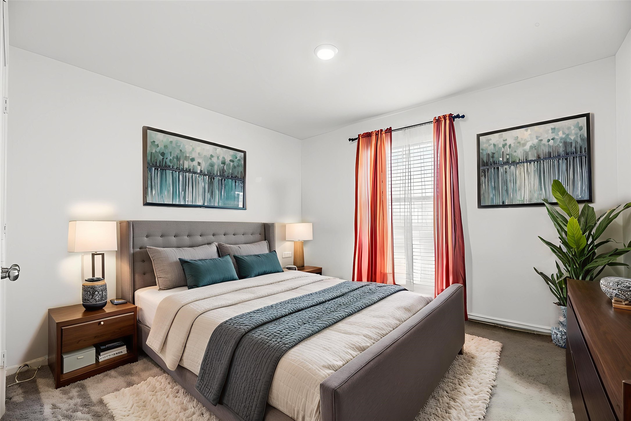 5423 Rosser Ruby Way Brookshire, TX 77423 - Photo 11 of 20 a bedroom with a large bed and a potted plant