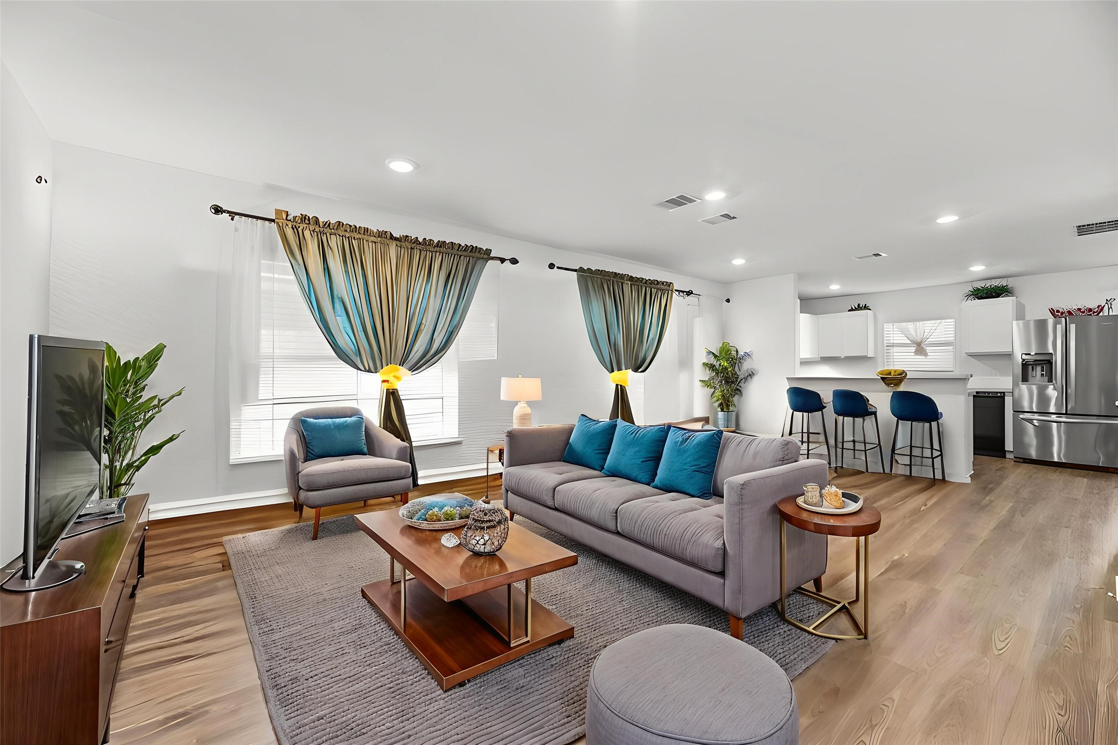 5423 Rosser Ruby Way Brookshire, TX 77423 - Photo 2 of 20 a living room with furniture and a wooden floor