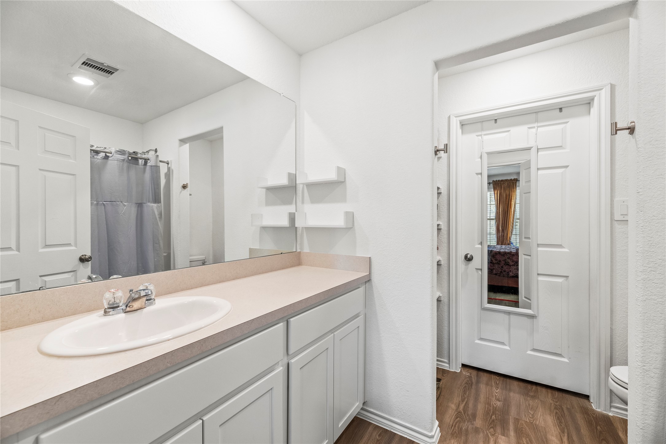 5423 Rosser Ruby Way Brookshire, TX 77423 - Photo 8 of 20 a bathroom with a sink and a mirror