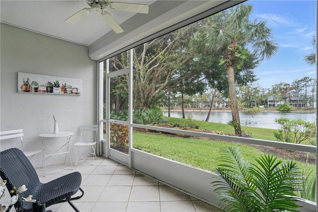 1220 Sarah Jean Circle, Unit L103 Naples, FL 34110 - Photo 30 of 50 a house view with a outdoor seating space