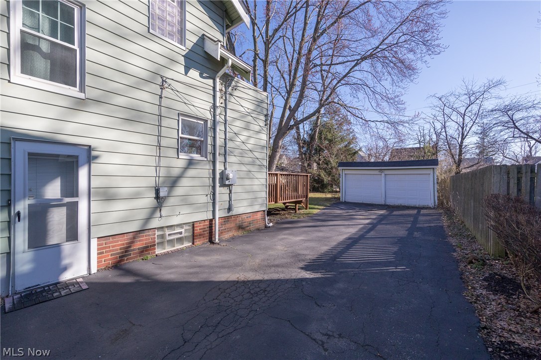 3996 Rosemond Road Cleveland Heights, OH 44121 - Photo 28 of 29 The two-car garage is shown at the end of the driveway