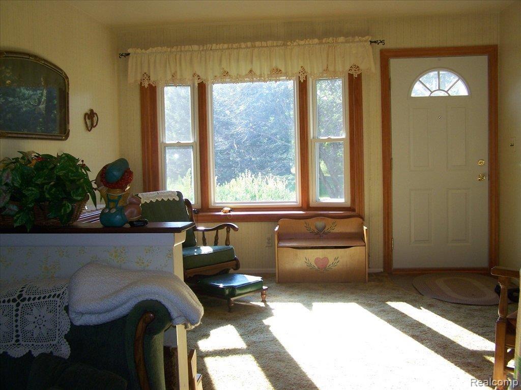 16775 Arnold Road Gregory, MI 48137 - Photo 4 of 14 SITTING ROOW WITH BAY WINDOW