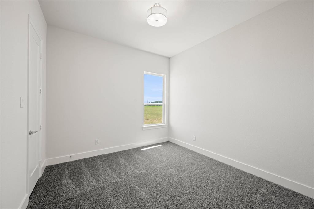 141 Olson Road Waxahachie, TX 75165 - Photo 12 of 24 an empty room with a window